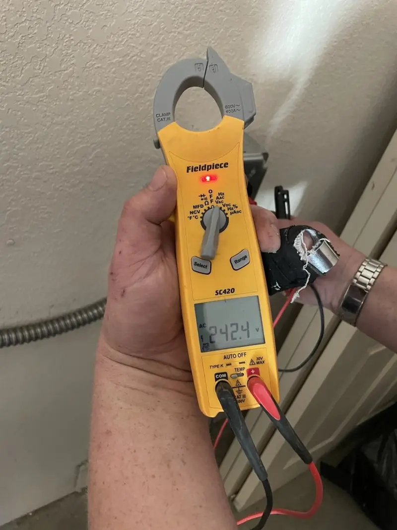 Voltage testing with clamp meter during Generator Installation in Wharton
